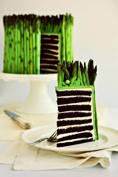 a slice of the asparagus cake revealing layered chocolate cake