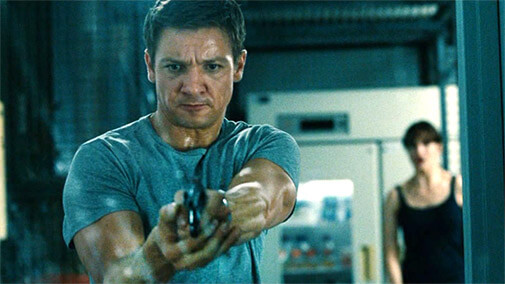 Jeremy Renner pointing a gun