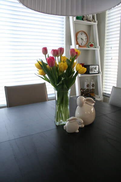 vase of tulips and Easter bunny decorations