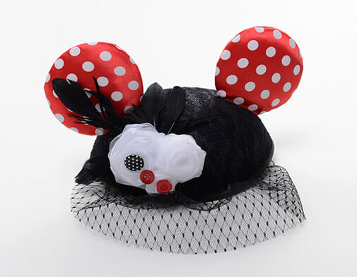 ear hat with red polka dot ears, white flowers, and mesh face veil