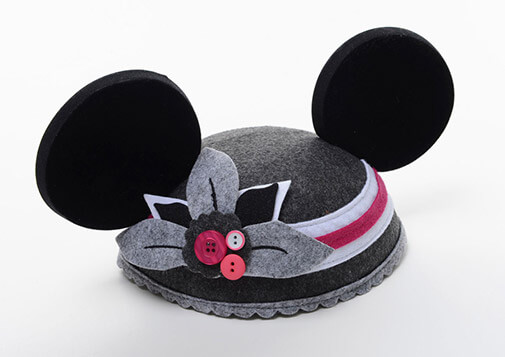 hat with felt stripes and flower, button details