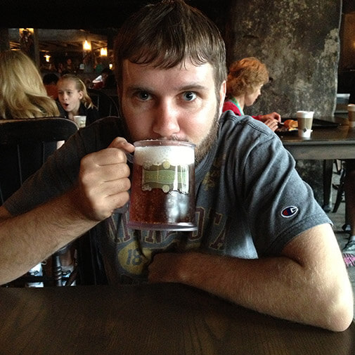Clay drinking a butter beer