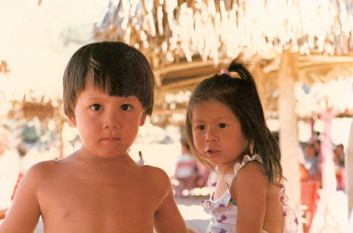 me and my brother as kids on the beach