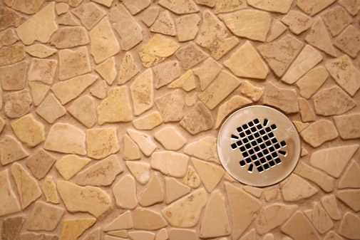 mosaic tile floor and drain