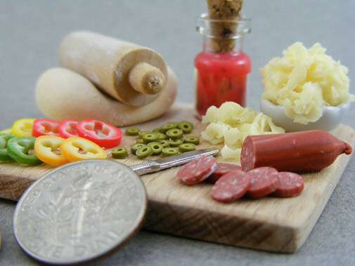 miniature cutting board with charuterie and veggies