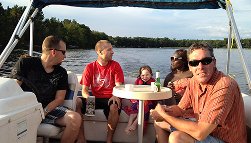 family on the pontoon