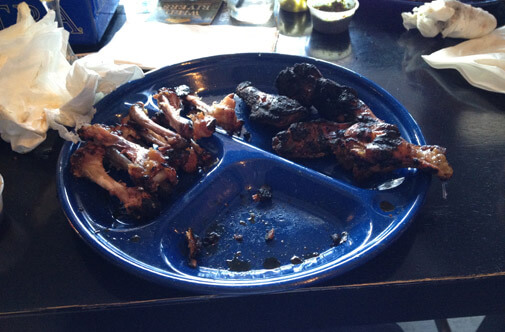 half-eaten plate of wings