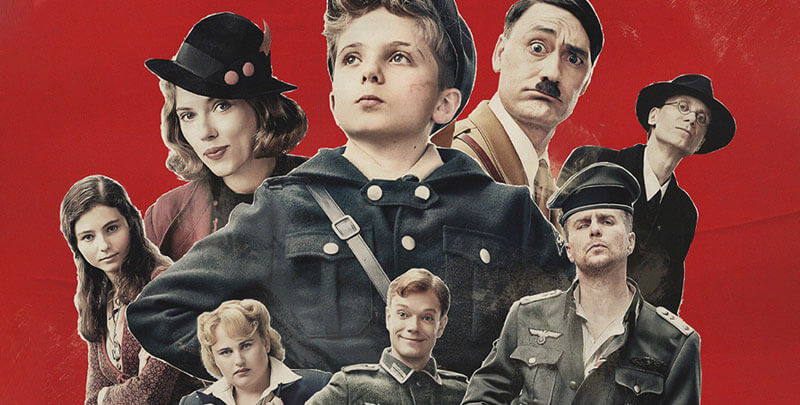 a young boy surrounded by supporting characters including Adolf Hitler