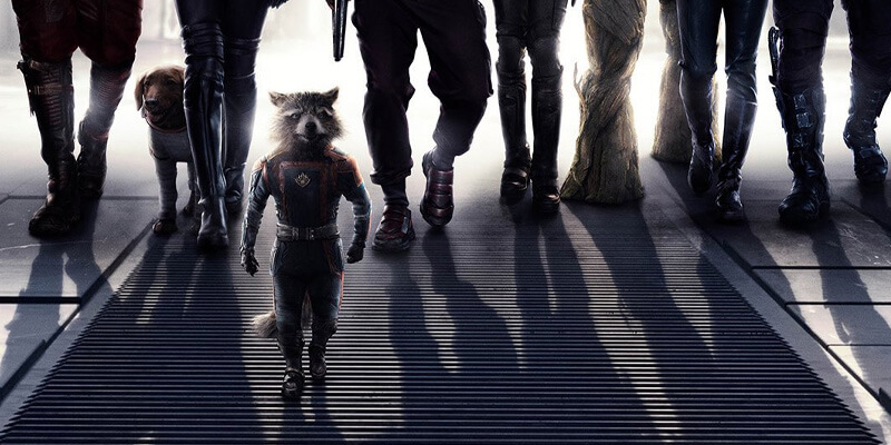 Rocket the raccoon walking in front of the Guardians (whose legs can be seen)