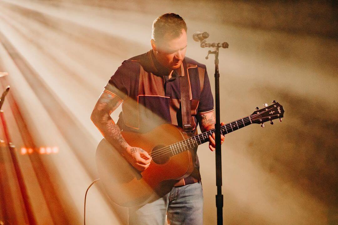 Chad playing guitar