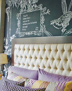 nice headboard with a chalkboard wall behind