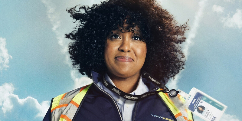 Natasha Rothwell as an airport employee