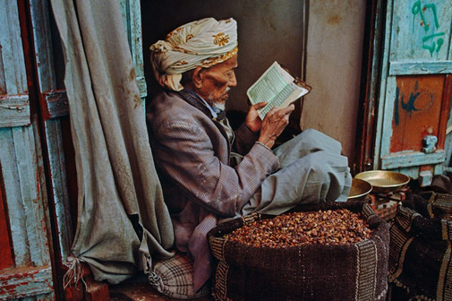 a grain salesman reads a book