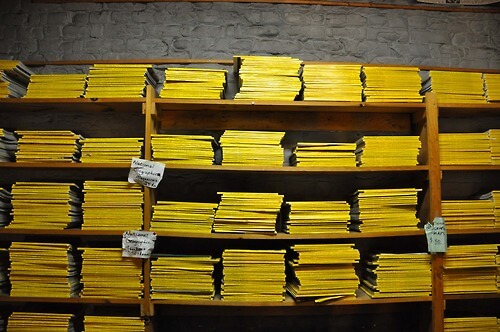 stacks of National Geographic magazines oganized neatly
