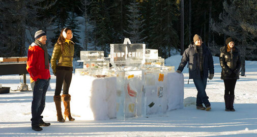 Padma standing by food frozen in ice blocks